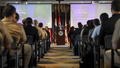 Dr. Leon Moores speaking in front of USU