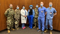 U.S. Air Force Maj. Angela Murphy, IMA to the Chief of Force Development and Training Branch, second from left, poses with fellow medics at Lincoln Hospital
