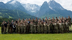 U.S. service members and medical personnel from various nations pose for a group photo during the European-African Military Nursing Exchange conference
