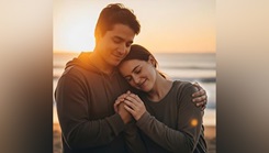 A couple holding hands on a beach