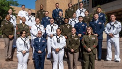 The 25 active-duty service members of Enlisted to Medical Degree Preparatory Program (EMDP2) Cohort 13 gather during orientation