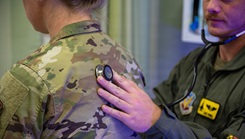 Flight surgeon conducting special duty physicals