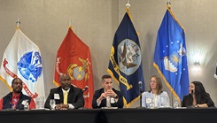 A panel of government and industry partners discussing warfighter readiness