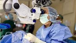 A doctor performing a surgery