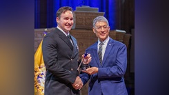 Chief Hospital Corpsman Robert Murphy receives the Hero of Military Medicine Award from Joseph Caravalho, president and chief executive officer of the Henry M. Jackson Foundation for the Advancement of Military Medicine