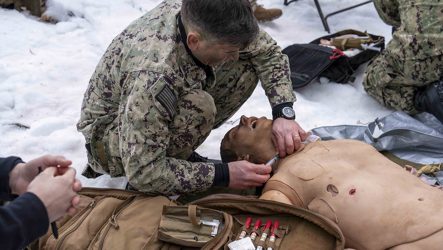 Hospital Corpsman 2nd Class Richard Blair, assigned to the Naval Postgraduate Dental School at the Naval Medical Leader and Professional Development Command, simulated administering a shot during a final exercise