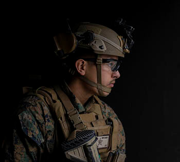 Modern combat helmets, like the one worn by this Marine, offer protection from both projectiles and blast waves. They are also designed to incorporate the use of communications equipment and other devices that can improve warfighter performance and capability. (Photo: Lance Cpl. Manuel Alvarado, U.S. Marine Corps)