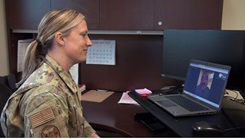 Military personnel working on their computer