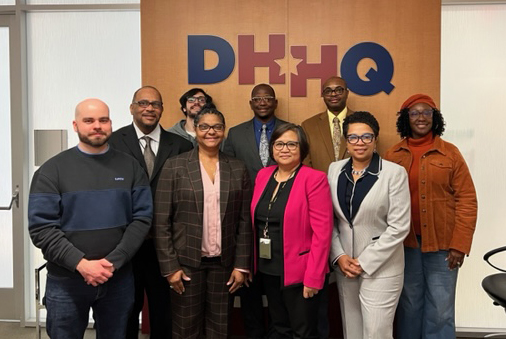 Image of The Defense Heath Agency Equal Opportunity and Diversity Management Office team comes together at a March 10 meeting at DHA headquarters. From front row, left to right: Tim Fahey, Director Tonja Ancrum, Luisa Gonzales, LaShunda Henry, and Mischele Anderson. Back row: Keith Gaiter, Darjan Karanfilovski, James Gilliam, and Reginald Diggins. EODM staff is dedicated to the need for clear and direct communication across the agency as DHA continues to grow exponentially. (Courtesy DHA Office of Internal Communications).