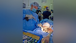 U.S. Naval Hospital (USNH) Yokosuka and Japan Self-Defense Force (JSDF) Hospital Yokosuka surgical personnel perform a simulated orthopedic procedure during a bilateral mass casualty drill