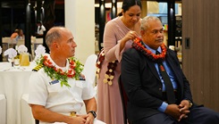 U.S. Navy Capt. Mark B. Stefanik, left, mission commander of Pacific Partnership 2025 (PP-25), and Tongan Capt. Sione Ulakai, the Deputy Chief of Defense Staff of His Majesty’s Armed Forces, participate in a closing ceremony at the Tanoa International Dateline Hotel