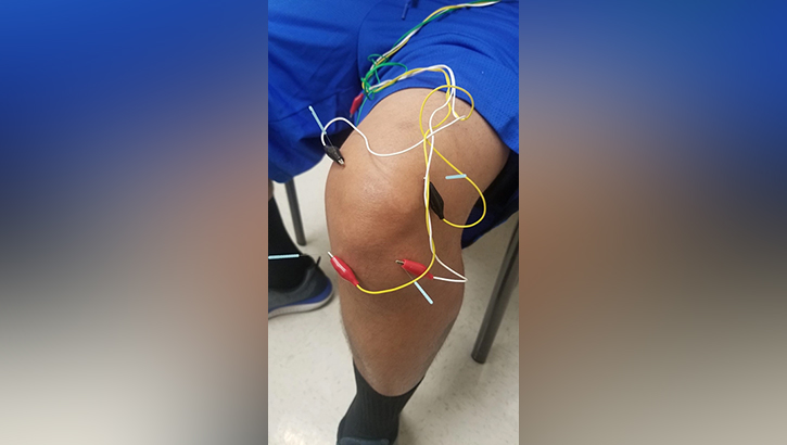 Image of A U.S. service member gets treated for chronic knee pain.
