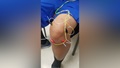 A U.S. service member gets treated for chronic knee pain