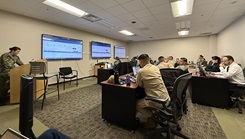 HM1 Katlyn Schrecengost, NMRLC Detachment Fort Detrick, leads Navy Medicine subject matter experts line item by line item during the Authorized Medical Allowance List review