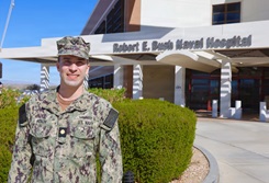 Lt. Cmdr. Matthew Horch, Navy Medicine Readiness and Training Command Twentynine Palms' Public Health Emergency Officer (PHEO) and occupational health department head, poses for a photo outside Robert E. Bush Naval Hospital