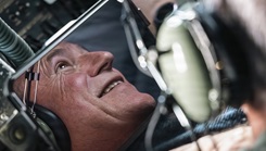U.S. Air Force Lt. Col. Mark 'Shank' Bigda, 104th Fighter Wing flight surgeon, views a refueling operation during his fini flight on a KC-135 Stratotanker