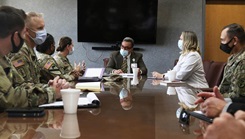 Military personnel meeting