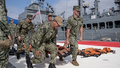 U.S. Navy Sailors assigned to Navy Medicine Readiness Training Command San Diego participate in a shipboard litter bearer training 