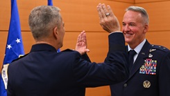 U.S. Air Force Lt. Gen. John J. DeGoes, Air Force and Space Force Surgeon General, administers the oath of office to Maj. Gen. James Parry, acting director of medical operations for the Office of the Air Force Surgeon General, during Parry’s promotion ceremony