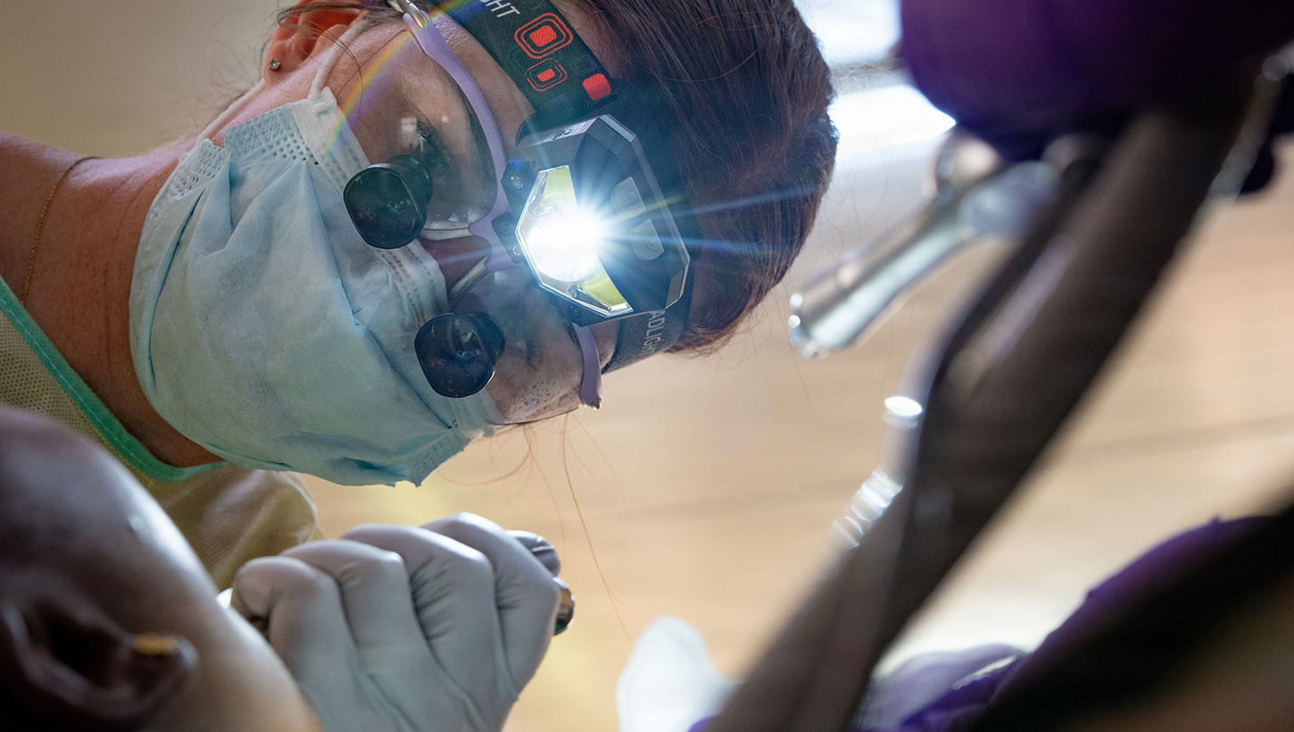 U.S. Air Force Reserve Maj. Kelsey Geiger, 434th Aerospace Medicine Squadron dentist, extracts a patient’s tooth during the Lesser Antilles Medical Assistance Team (LAMAT) 2026 mission