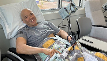 U.S. Army Sgt. 1st Class David Hong recovers after surgery for colon cancer.