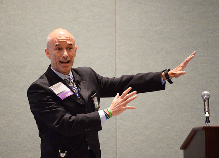 Servio Medina from the Cyber Policy Branch of the Defense Health Agency speaks at DHITS 2018 on the need for exercising cyber fitness practices in today's technology driven life.