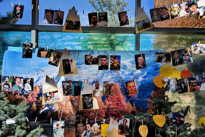Young military family members at a Tragedy Assistance Program for Survivors Good Grief Camp in Denver, Colorado, created this collage to memorialize their lost loved ones. (U.S. Air Force photo by Senior Airman Arielle Vasquez) 