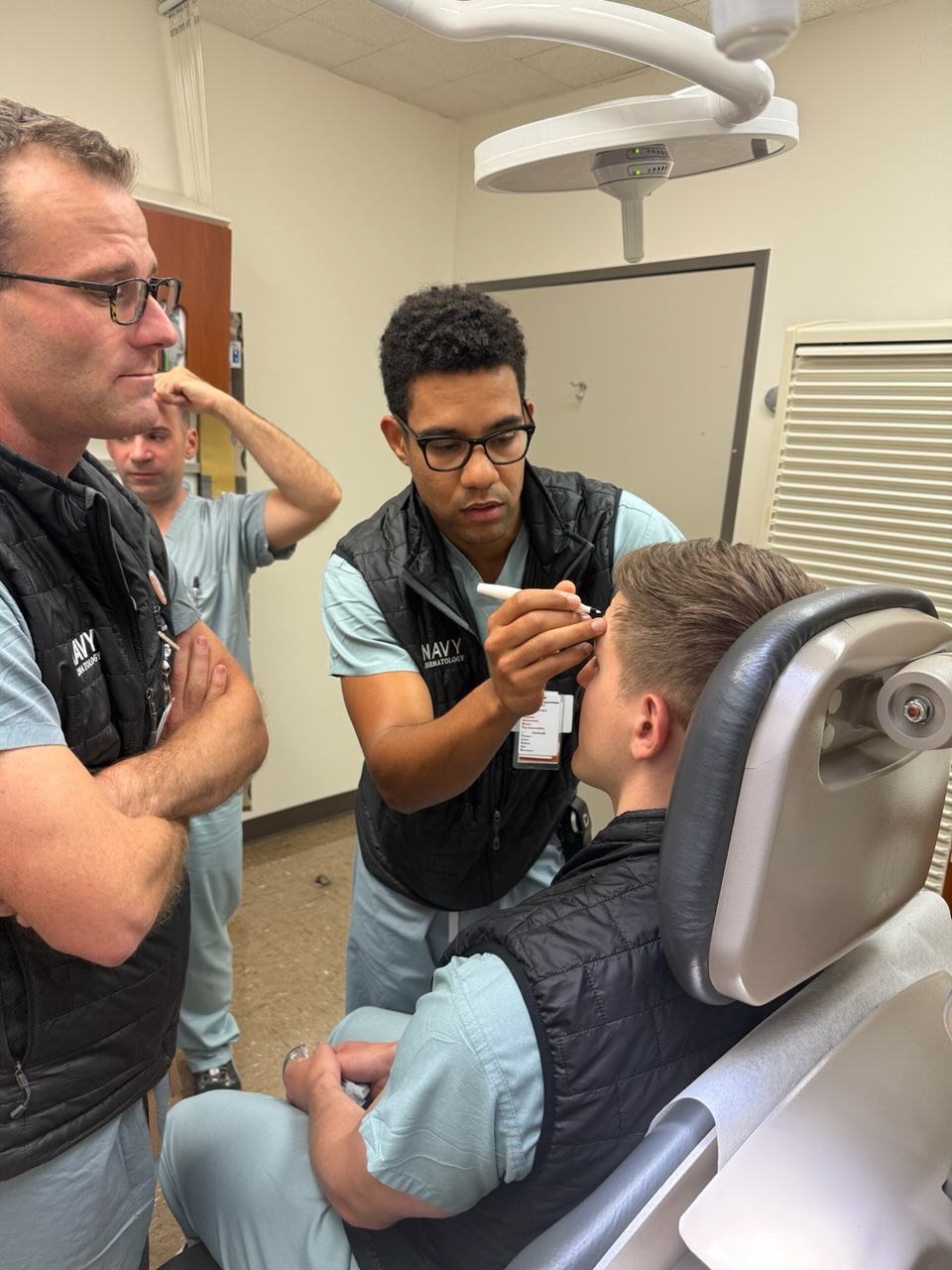 Dermatology faculty providing training to the Dermatology residents