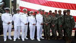 U.S. Naval Medical Force Pacific’s Unit Deployment Cell members join Naval Expeditionary Medicine Warfighter Development center personnel to celebrate the official establishment of the new command at Camp Pendleton, California, Oct. 2, 2024.