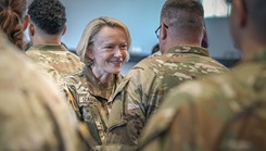 U.S. Army Lt. Gen. Mary K. Izaguirre, Surgeon General and Commanding General, U.S. Army Medical Command, places the unit patch on soldier during an activation ceremony Sept. 20 in Sembach, Germany. 