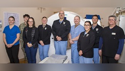 Radiology Department staff assigned to Naval Hospital Bremerton take a pause from their diagnostic exam to take a group picture