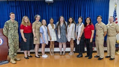 Participants, instructors, American Red Cross representatives and staff from the Directorate of Dental Services pose for a group photo during a Red Cross Dental Assistant Program recognition ceremony 