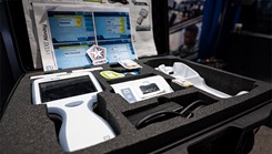 An Analyzer Traumatic Brain Injury device sits on display at the Operational Medical Systems Program Management Office exhibit during the Military Health System Research Symposium