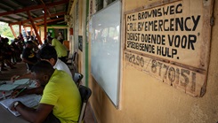 Surinamese patients wait to be seen during a Lesser Antilles Medical Assistance Team (LAMAT) 2026 mission