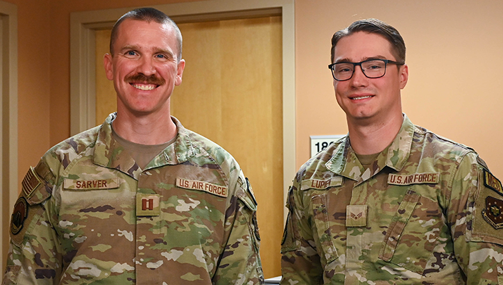 From left, U.S. Air Force Capt. Max Sarver, Luke Medical Group Operational Medical Readiness Squadron optometry element chief, and Senior Airman Wyatt Lupien, 56th Operational Medical Readiness Squadron optometry technician, pose for a portrait