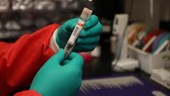 A laboratory technician at the Center for Military Psychiatry and Neuroscience at the U.S. Army Medical Research and Development Command’s Walter Reed Army Institute of Research prepares a blood sample collected from a burn patient for analysis. 