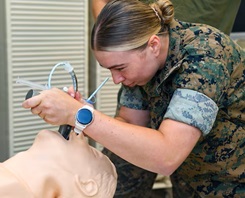 Corpsman does en-route care