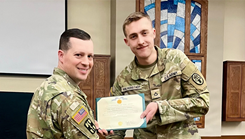 Munson Army Health Center Medical Company Commander Capt. Andrew Ingalls named Munson Combat Medic Specialist Pfc. Harris Halverstadt as Soldier of the Quarter during an awards ceremony