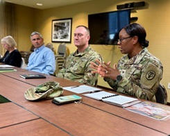 Munson Army Health Center Director Col. Jolanda L.J. Walker, right, speaks about cold and flu season during the Leavenworth-Lansing Military Affairs Committee meeting