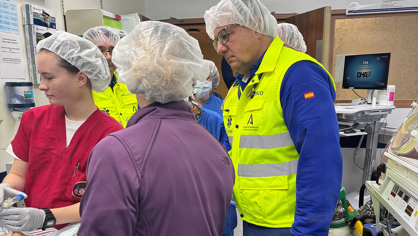 U.S. Naval Hospital Rota neonatal response team members participate in a simulated neonatal emergency alongside Spanish 061 emergency medical services personnel in the operating room 