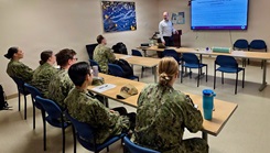 Dr. Geoffrey S. Jacoby, an occupational medicine physician from Branch Health Clinic Port Hueneme, instructs Sailors during a National Institute for Occupational Safety and Health (NIOSH)-certified spirometry training course