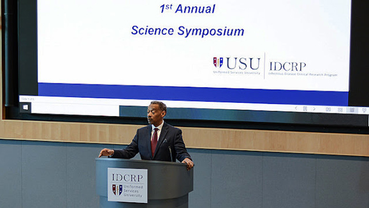 Uniformed Services University President Dr. Jonathan Woodson delivered opening remarks during IDCRP's first annual Science Symposium March 6-10. The event was held in collaboration with the Defense Health Agency Infectious Disease Working Group Subcommittee. (Photo by  HJF communications)