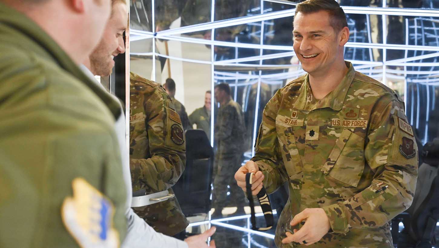 Air Force Lt. Col. Carsten Stahr, the 28th Force Support Squadron commander, steps out of the MindGym, a tactical training simulator