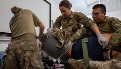 U.S. Army Soldiers from the 932nd Forward Resuscitative Surgical Detachment perform a simulated wound assessment on a patient as the first step in developing a comprehensive plan of care during a collective training exercise at Fort Cavazos, Texas, Oct. 21, 2024. These CTEs reinforce their skill sets to bolster U.S. Army medical capabilities and ensure soldier proficiencies with lifesaving measures. (Photo by U.S. Army Reserve Sgt. Veronica Van Doran) 