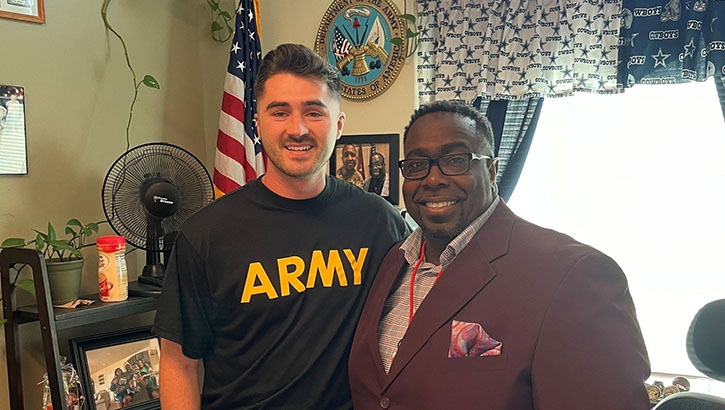 Sgt Russel Mendenhall and Recovery Care Coordinator Kenneth Tate pose for picture