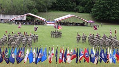 U.S. Army medical Soldiers stand in formation as Medical Readiness Command, Europe (MRC, EUR) bids farewell to U.S. Army Brig. Gen. Roger Giraud during a change of command ceremony