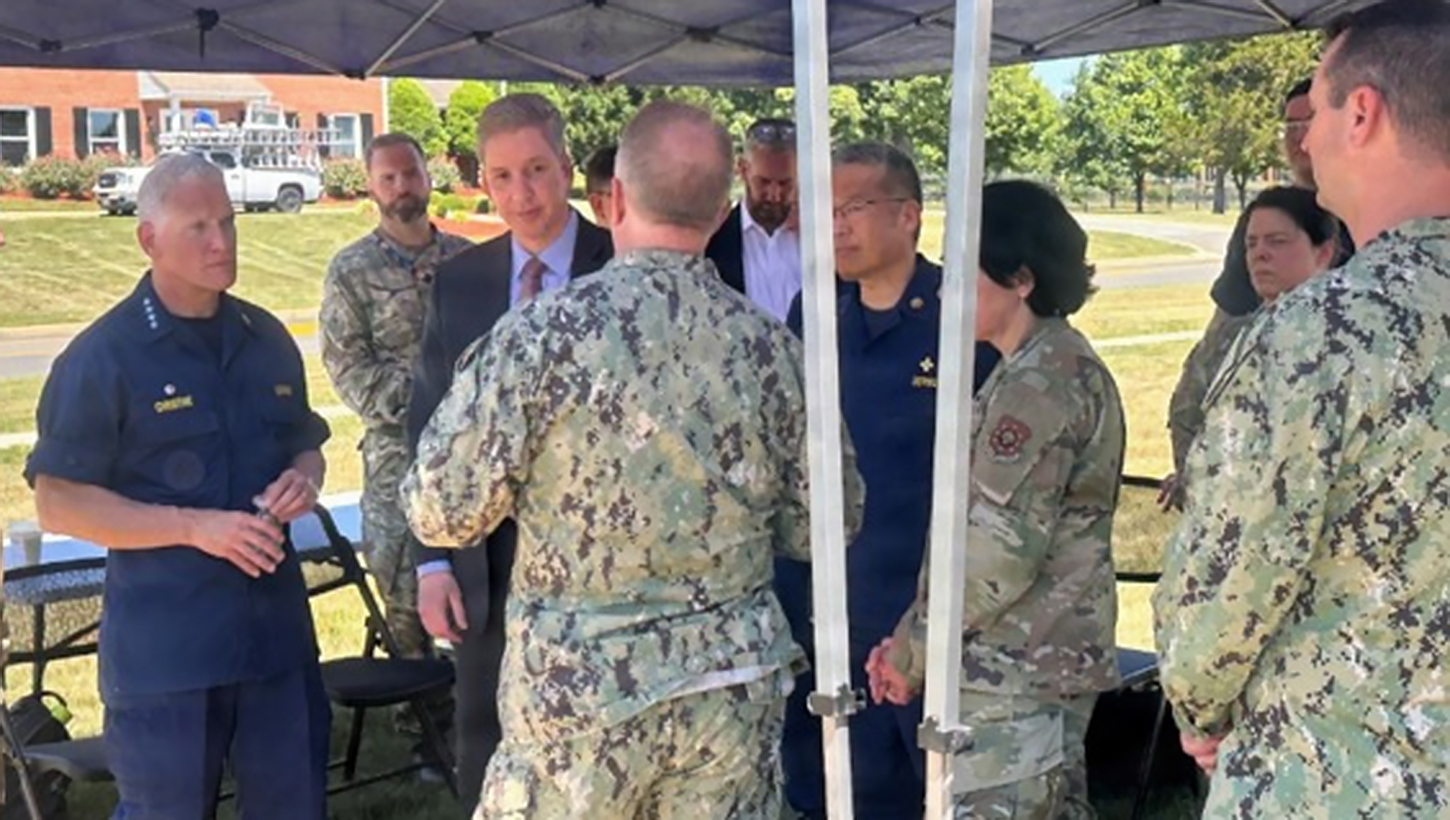 Maj. Gen. John Murray, Joint Staff surgeon, Adm. Brian Christine, assistant secretary for Health and head of the U.S. Public Health Service Commissioned Corps and the Honorable Keith Bass, assistant secretary of defense for Health Affairs, receive briefs during an Ebola response training visit