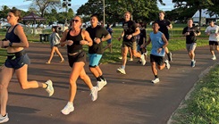 Photo of USU students running