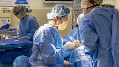 Physician performing medical procedure