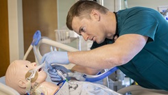 An intensive care unit patient was crashing. Blood pressure dropping, oxygen levels falling, the ventilator struggling to keep pace. The monitors were going off. A nurse cut through the room, adjusting drips, troubleshooting equipment, calling for backup.